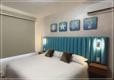 Cama o camas de una habitación en Suite Ballena Hermoso alojamiento Familiar