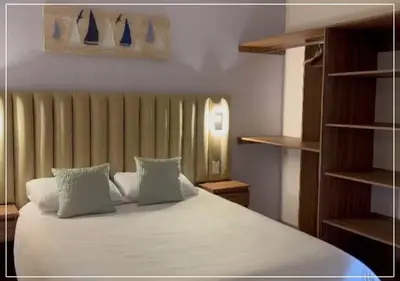 Cama o camas de una habitación en Suite Ballena Hermoso alojamiento Familiar