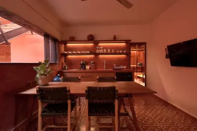 Una televisión o centro de entretenimiento en Casa Alta Vista Terraza diseno ubicacion AC