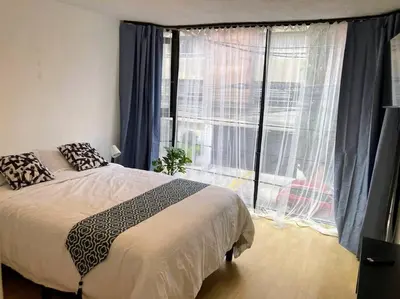 Cama o camas de una habitación en Ubicadísimo departamento
