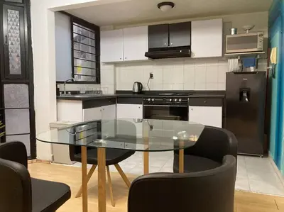 Una cocina o zona de cocina en Ubicadísimo departamento
