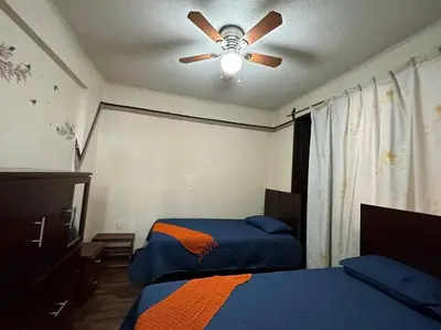Cama o camas de una habitación en Departamento Colibrí