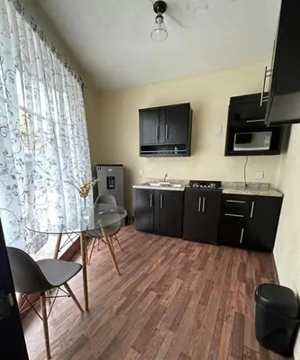 Una cocina o zona de cocina en Departamento Colibrí