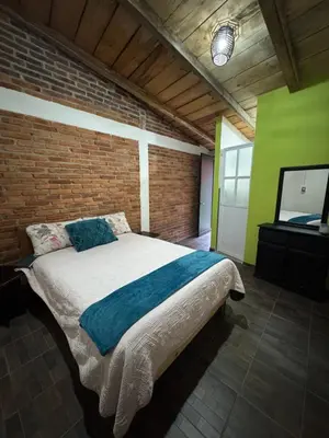 Cama o camas de una habitación en Rincón del Ángel
