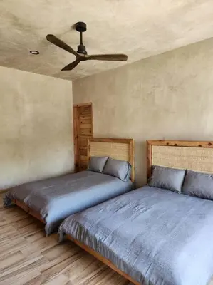 Cama o camas de una habitación en ACOGEDORA CASa EN MALINALCO