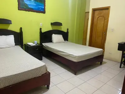 Cama o camas de una habitación en Hotel Real