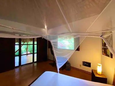 Cama o camas de una habitación en Cabaña El Cactus Playa Mermejita