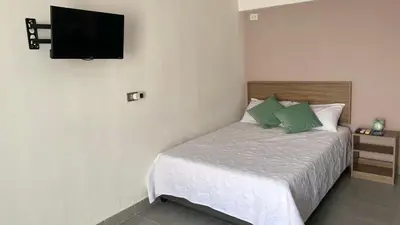 Cama o camas de una habitación en Loft a 3 min del mar