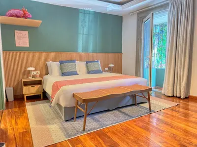 Cama o camas de una habitación en Hotel Boutique Casa Alebrije