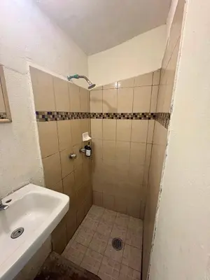 Un baño de Casa de la Gente Nube