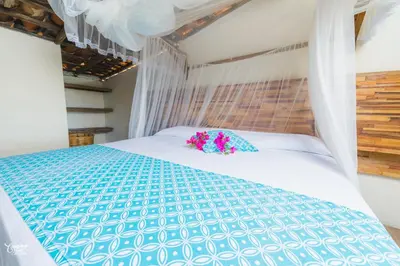 Cama o camas de una habitación en Casa de la Gente Nube