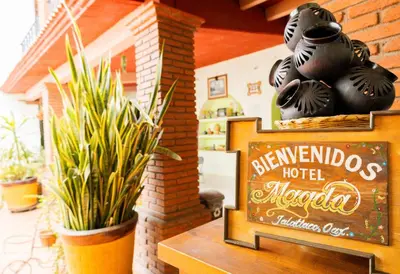 Certificado, premio, señal o documento que está expuesto en Hotel Magda