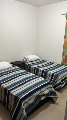 Cama o camas de una habitación en Departamento tiempo de relax