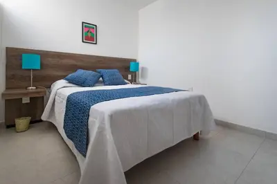 Cama o camas de una habitación en R4 Oaxaca Experience