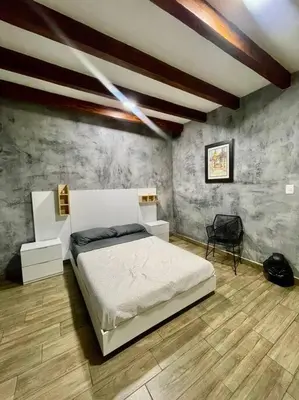 Cama o camas de una habitación en Departamento Blausee