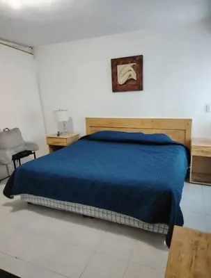 Cama o camas de una habitación en Buen lugar para descansar