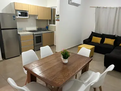 Una cocina o zona de cocina en Departamento tiempo de relax