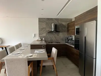 Una cocina o zona de cocina en Lovely 3 bedroom condo with rooftop