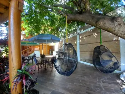 Un patio o zona al aire libre en Hotel Cabaña iilldaa