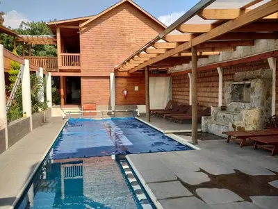 Piscina en o cerca de Hotel Cabaña iilldaa