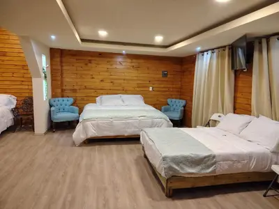 Cama o camas de una habitación en Hotel Cabaña iilldaa
