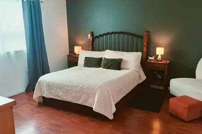 Cama o camas de una habitación en Residencia amplia en Cholula