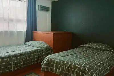 Cama o camas de una habitación en Residencia amplia en Cholula