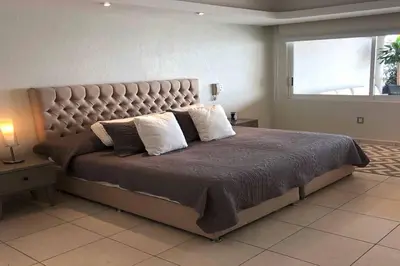 Cama o camas de una habitación en Penthouse en Las Brisas Acapulco