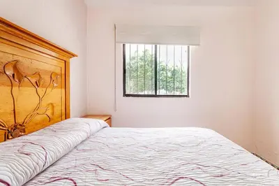 Cama o camas de una habitación en Casa de descanso con alberca en burgos Cuernavaca
