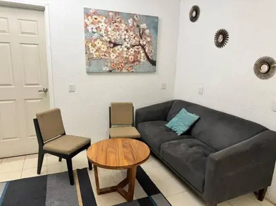 Zona de estar de Departamento de las flores