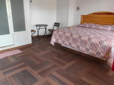 Cama o camas de una habitación en Jardin Cualli Cochi