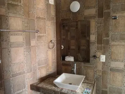 Un baño de Jardin Cualli Cochi