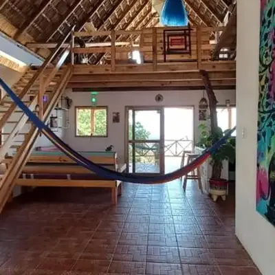 casa cabaña con vista al océano