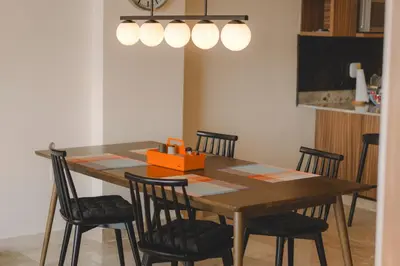Una televisión o centro de entretenimiento en Exclusivo Departamento con vista a la marina