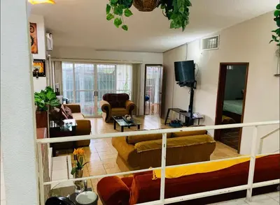 Una televisión o centro de entretenimiento en Casa MONTEALEGRE