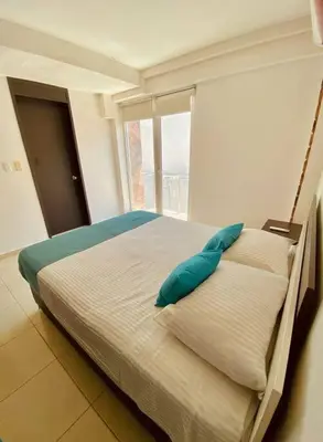 Cama o camas de una habitación en Depto Excelente ubicación Vista parcial Mar