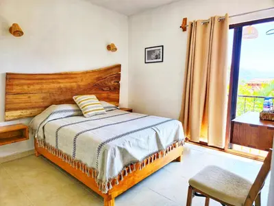 Cama o camas de una habitación en Casa Flores