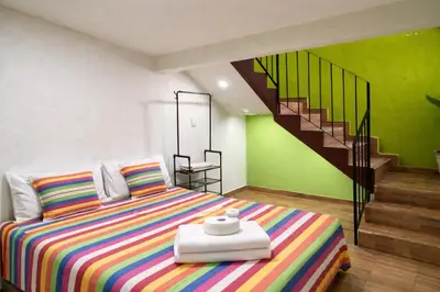 Cama o camas de una habitación en Hostal Casa Alixel