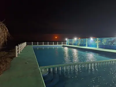 Piscina en o cerca de La Playita