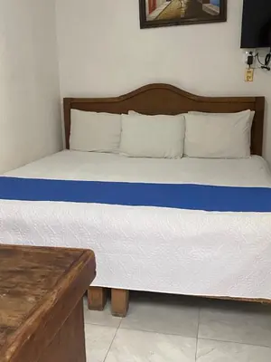 Cama o camas de una habitación en Hotel Nacional