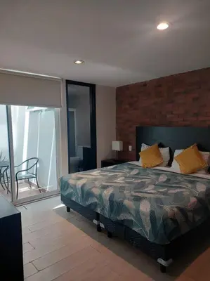 Cama o camas de una habitación en Departamento en Cholula Pue La Lunita C1