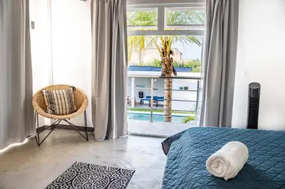 Cama o camas de una habitación en Vida Casa Kuxtal Rooftop con vista al Lago