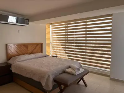 Cama o camas de una habitación en Departamento con vista a la bahia