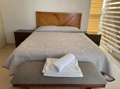 Cama o camas de una habitación en Departamento con vista a la bahia