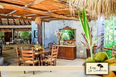Un restaurante o sitio para comer en Casa Los Cocoteros