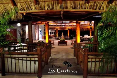 Un restaurante o sitio para comer en Casa Los Cocoteros