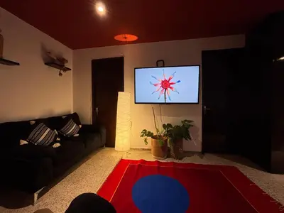 Una televisión o centro de entretenimiento en Departamento en el centro de Oaxaca