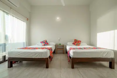 Cama o camas de una habitación en Casa Flores Zicatela