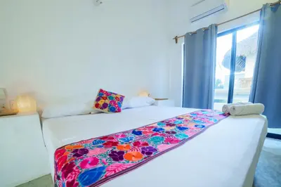 Cama o camas de una habitación en Casa Flores Zicatela