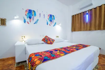Cama o camas de una habitación en Casa Flores Zicatela